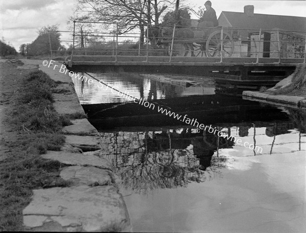 DONKEY AND CART ON FRAGILE CANAL BRIDGE